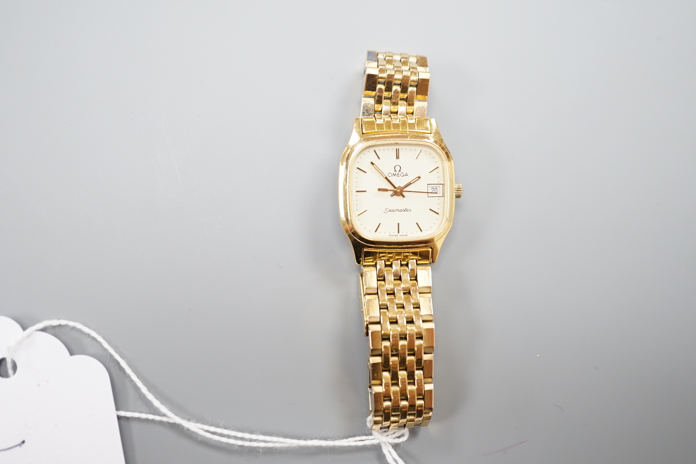 A lady's steel and gold plated Omega Seamaster quartz wrist watch, on an Omega gold plated bracelet (with spare links).